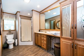 Shower, hair dryer, towels, soap