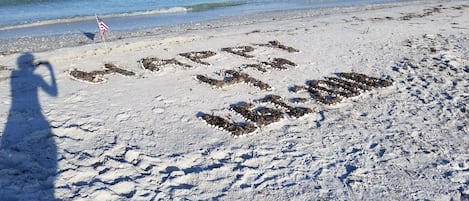 On the beach, sun loungers, beach towels