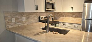 Fridge, microwave, oven, stovetop - Little Gasparilla Island - Gulf view, golf cart, ferry, pool, boat dock, parking (Placida)