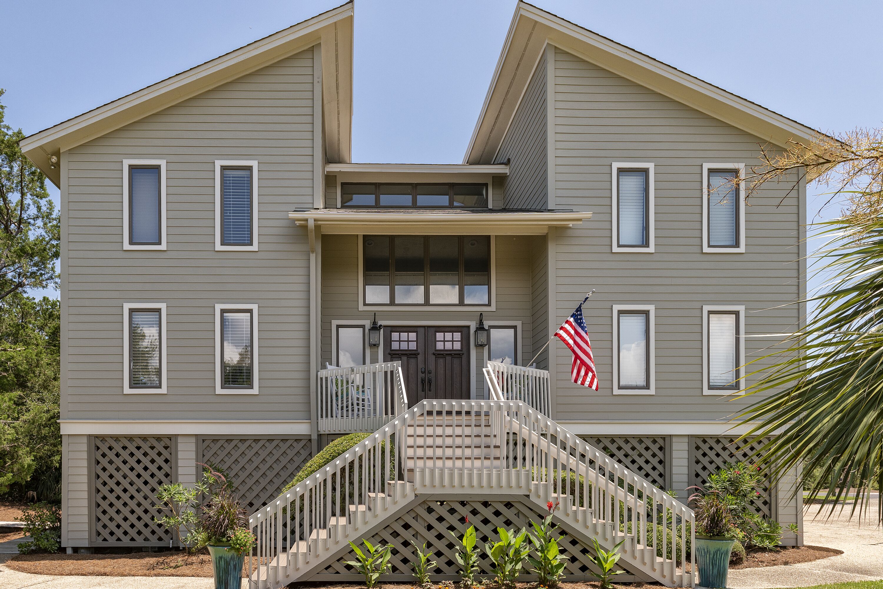 Spectacular, updated 4 BR, 3.5 BA home with boardwalk access and Amenity Cards!