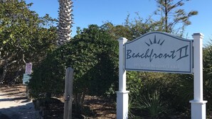 A sign for Beachfront II, indicating a beach trail. - Beachfront II Condos. Affordable Get-Away with Public Beach Access! (Santa Rosa Beach)