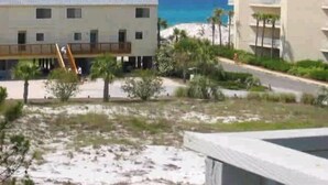 A beachfront hotel with a pool, a beach, and a view of the ocean. - Beachfront II Condos. Affordable Get-Away with Public Beach Access! (Santa Rosa Beach)