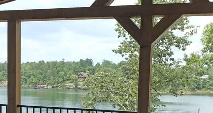 Point lot w/beautiful views! Deep water, 2-story dock, min steps to water.