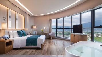 Deluxe Suite, 1 King Bed, Non Smoking | Minibar, in-room safe, iron/ironing board, free WiFi