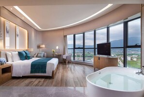 Suite Deluxe, 1 cama de matrimonio grande, no fumadores | Minibar, caja fuerte, tabla de planchar con plancha y wifi gratis