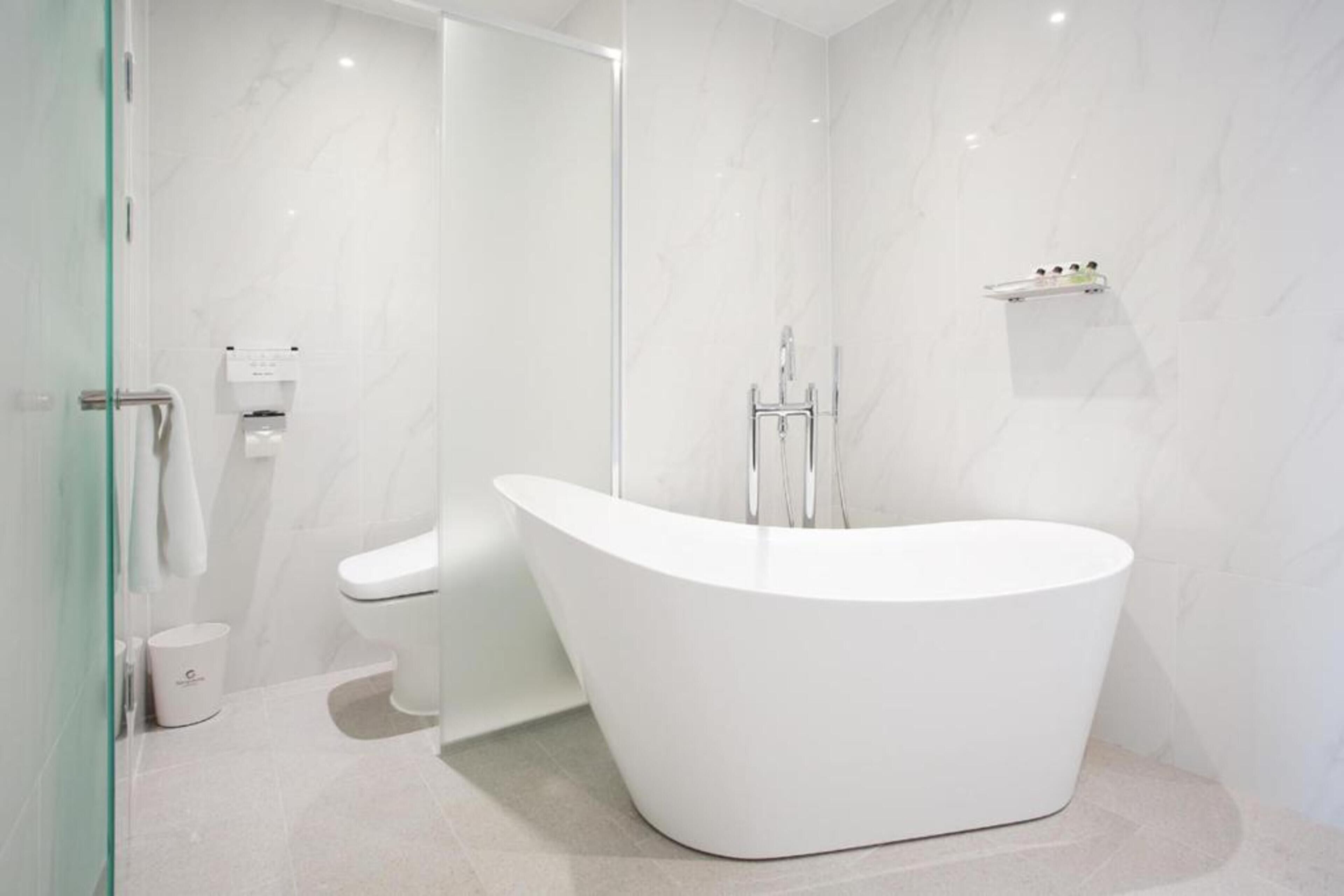 city suite | bathroom | shower, hair dryer, bathrobes, towels