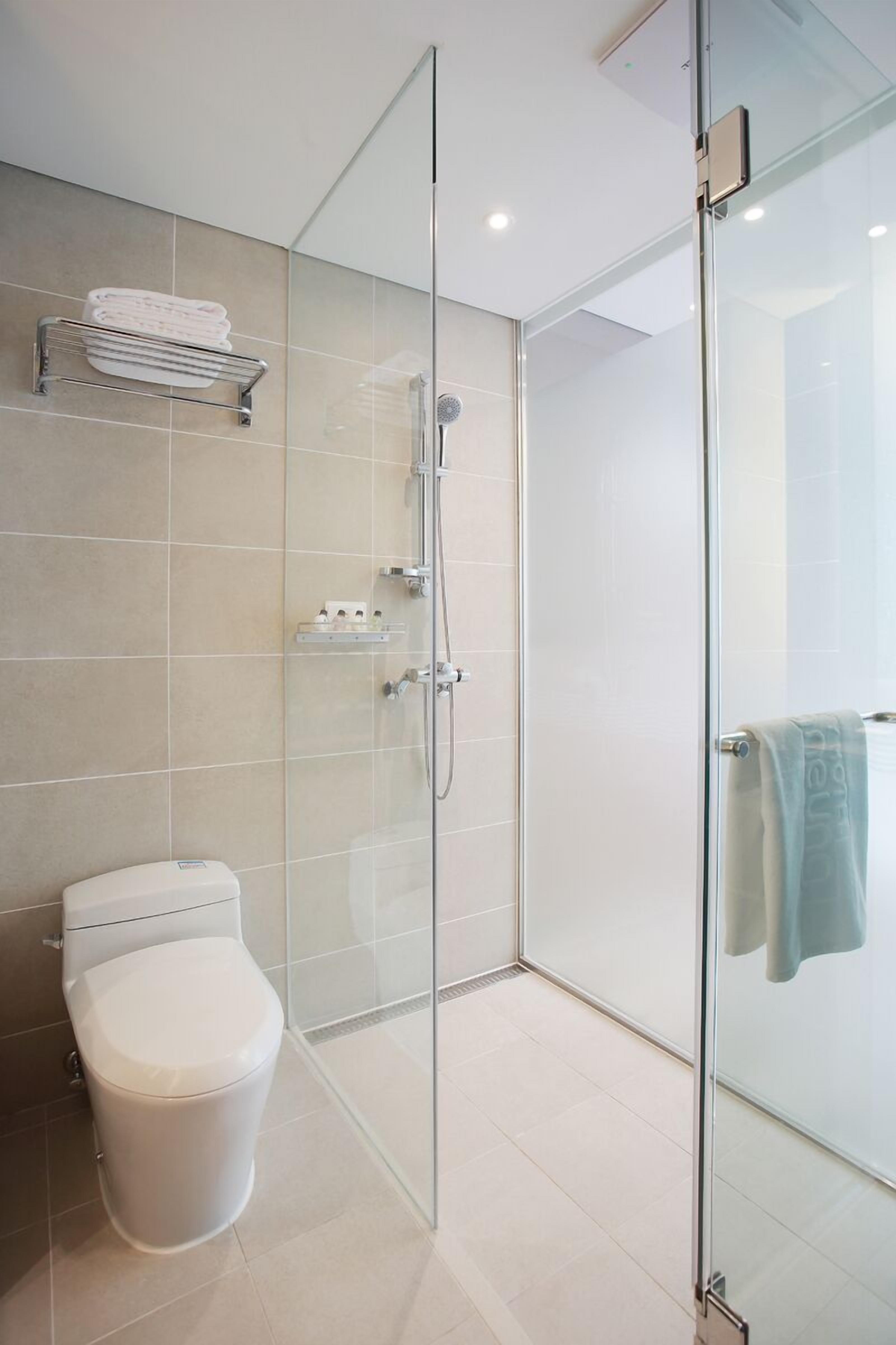 shower, hair dryer, bathrobes, towels