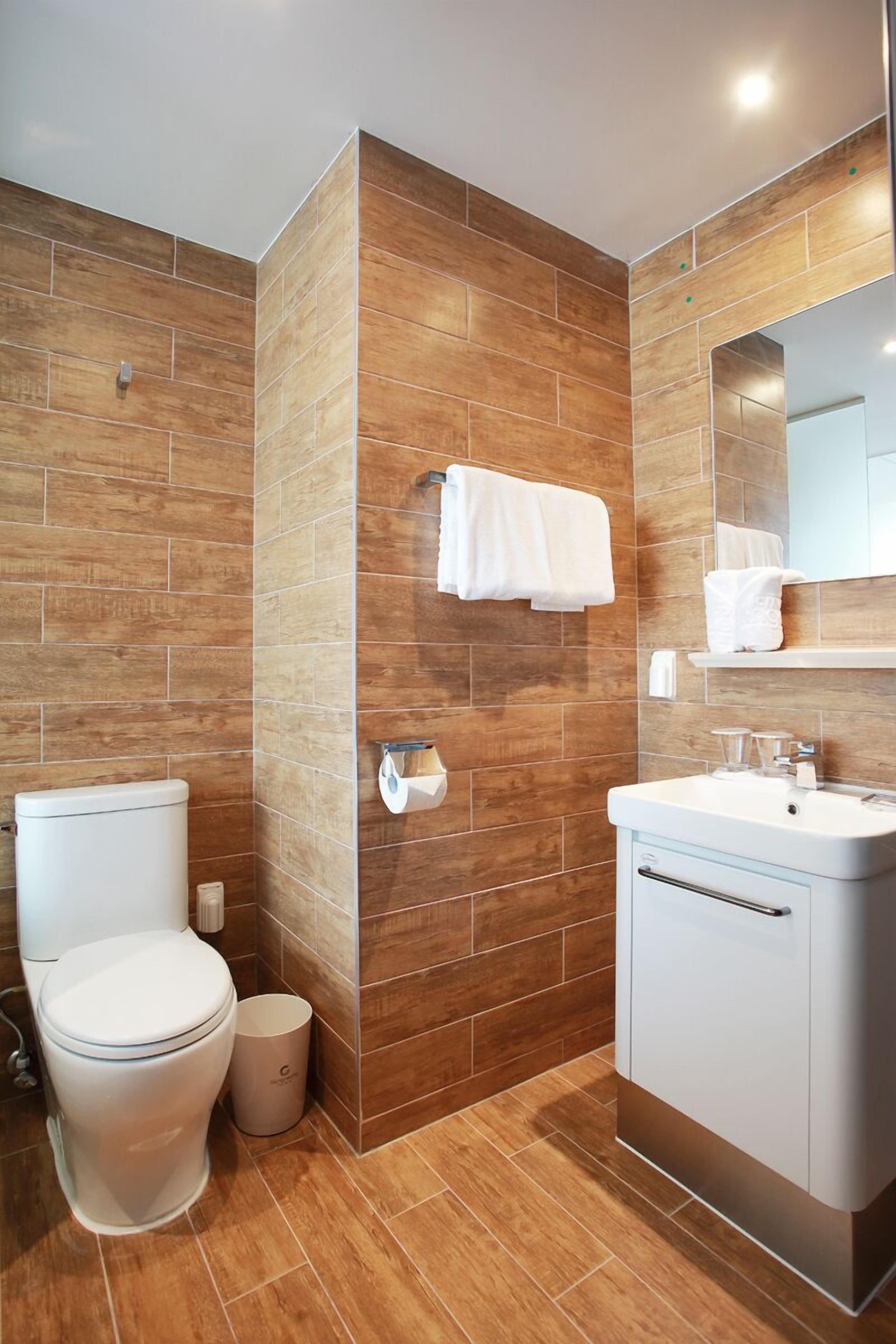 shower, hair dryer, bathrobes, towels