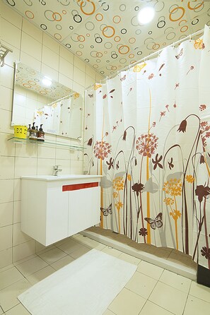 Shower, free toiletries, hair dryer, slippers