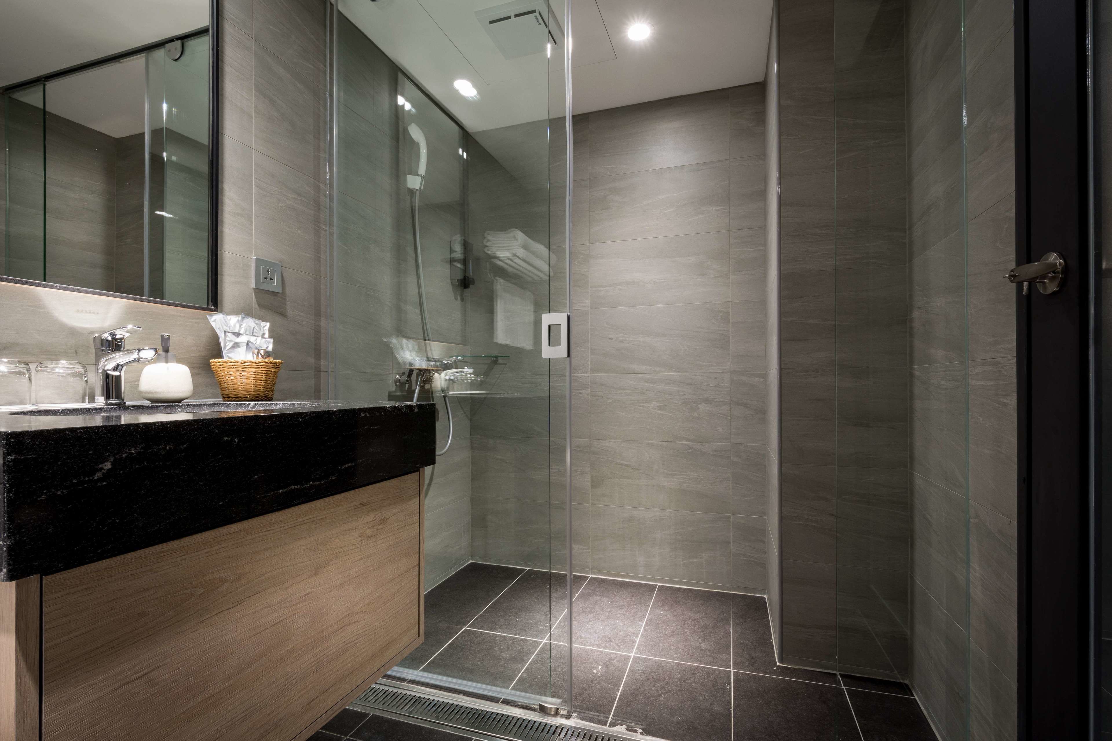 deluxe suite, 2 bedrooms | bathroom | shower, free toiletries, hair dryer, slippers