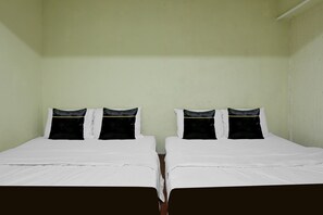 Suite familiar | Escritorio, wifi gratis y ropa de cama 