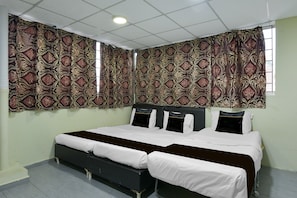 Kamar Triple Deluks | Meja kerja, Wi-Fi gratis, dan seprai linen