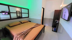 Desk, blackout curtains, free WiFi, bed sheets