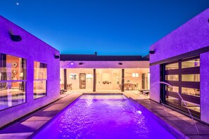 A heated pool, pool loungers