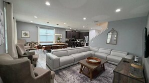 Flat-screen TV, table football, ping pong, toys