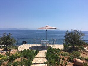 Outdoor dining - Beachfront Holiday Apartment (Rafina)
