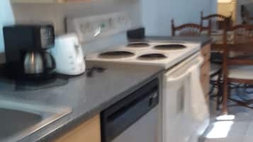 Coffee/tea maker, fridge, microwave, oven