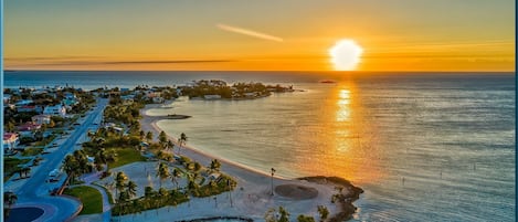 On the beach, sun-loungers, beach towels