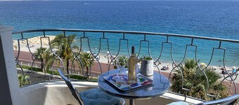 AMAZING VIEW!! 30 Seconds to Beach! A/C,WIFI,Phone,TV, Balcony