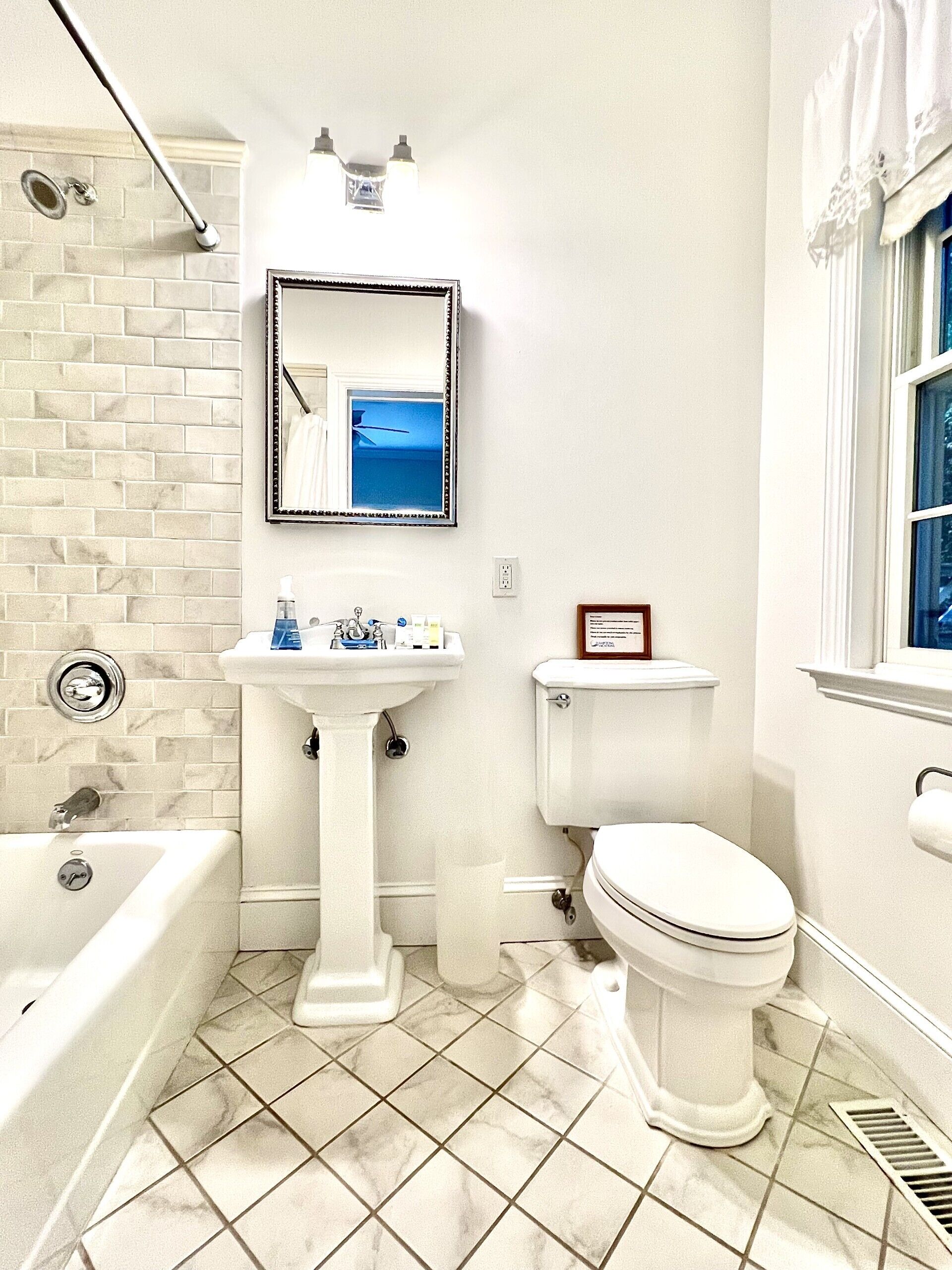 1st floor queen bedroom private bath with custom tile and Kohler fixtures
