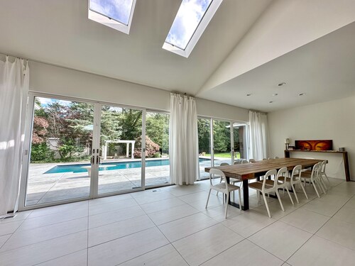 “5BR Modern Zen Estate • Pool, Hot Tub, Steam Room, Near Beaches”