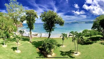 On the beach, sun-loungers, beach towels