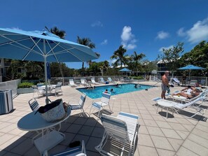 Outdoor pool, a heated pool - FULL TIME LIC MGR - MODERN 2/2 COCONUT PALM VILLA - OCEANFRONT BEACH RESORT! (Key Largo)