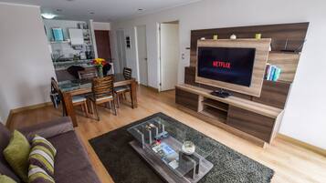 Smart TV, DVD player, foosball, books