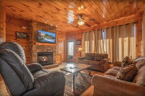 Smart TV, chimenea, consola de videojuegos