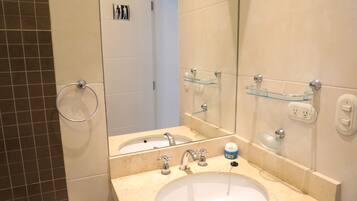 Combined shower/tub, hair dryer, towels, soap