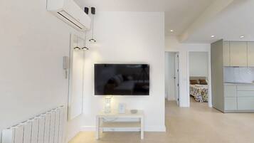 2 dormitorios, tabla de planchar con plancha, wifi gratis y ropa de cama