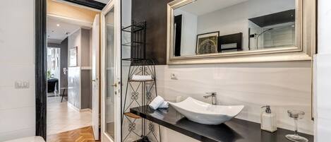 Combined shower/tub, jetted tub, hair dryer, bidet