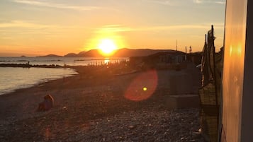Beach nearby, sun loungers