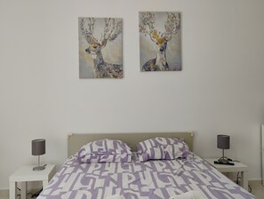 1 habitación, tabla de planchar con plancha, wifi y ropa de cama 