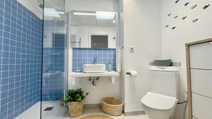 Bathtub, hair dryer, towels