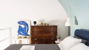 2 habitaciones, tabla de planchar con plancha, cuna de viaje y wifi