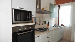 Private kitchen - TRILO GEMELLI 2: comfortable apartment at the Lido beach (Alghero)