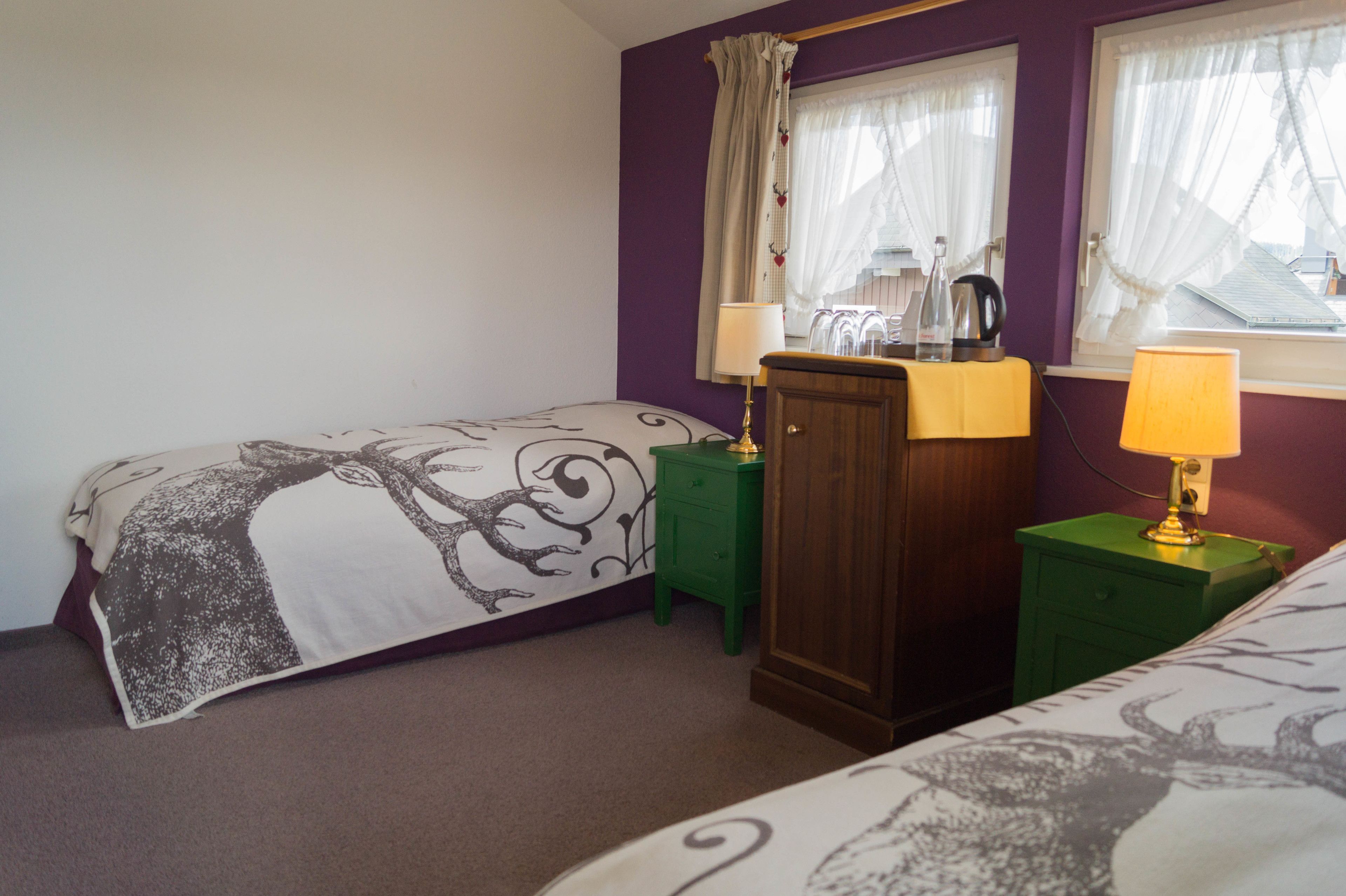 quadruple room, 2 bedrooms | in-room safe, desk, blackout curtains, rollaway beds