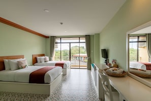 Deluxe Twin | Free Bus & Free 24hr Co-Working Space | Down comforters, in-room safe, blackout drapes, iron/ironing board