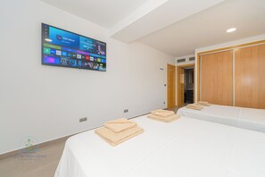 3 bedrooms, iron/ironing board, travel cot, WiFi