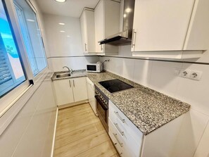 Fridge, microwave, oven, stovetop - Mirador al Mar 56 by homeprive (Denia)