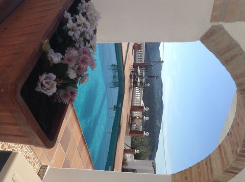 pool side apartment with a large luxury private roof terrace