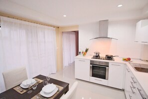 2 Bedrooms Villa | Private kitchen | Full-sized fridge, microwave, stovetop, coffee/tea maker