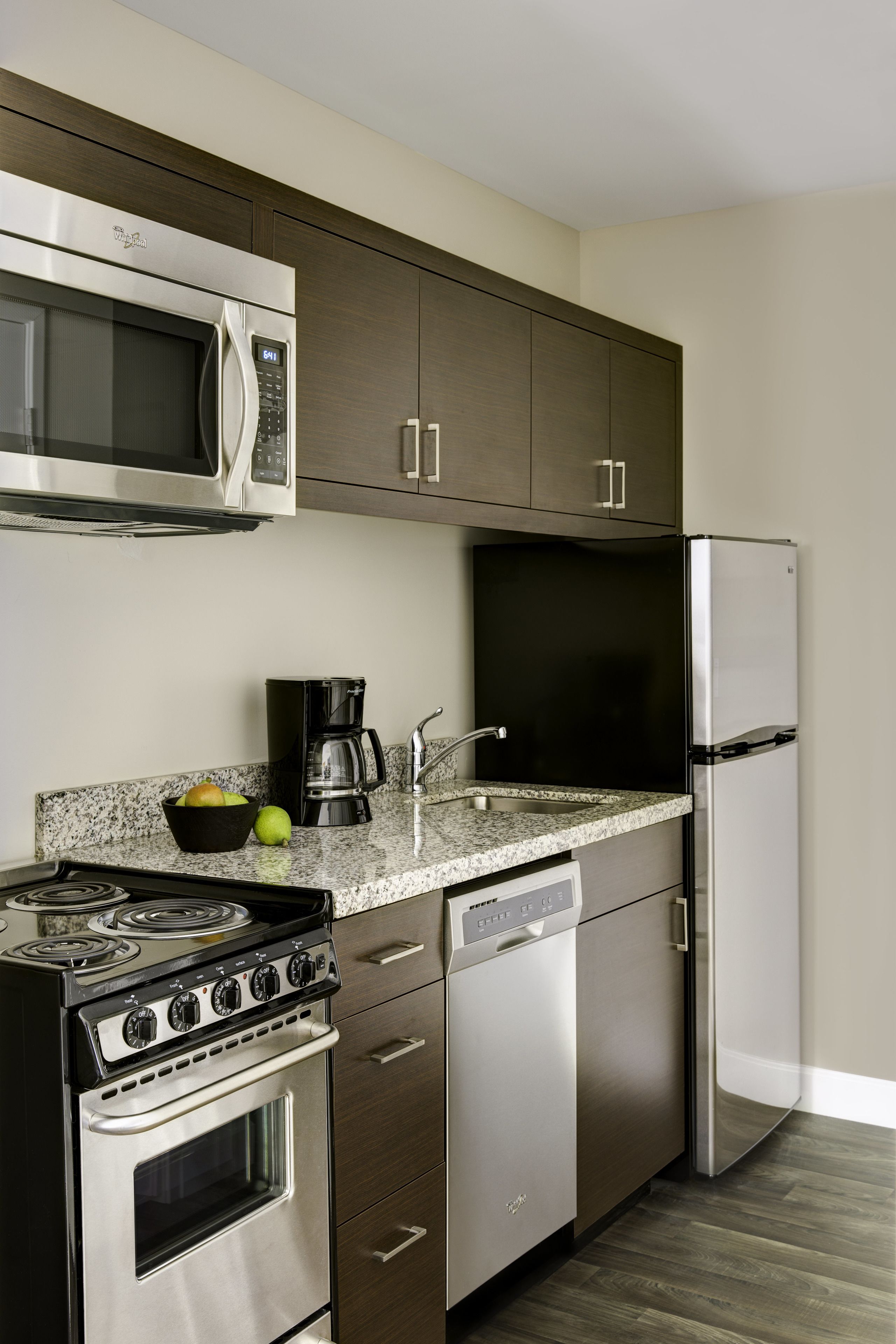 full-sized fridge, microwave, stovetop, dishwasher