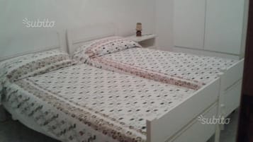 2 habitaciones, tabla de planchar con plancha y ropa de cama