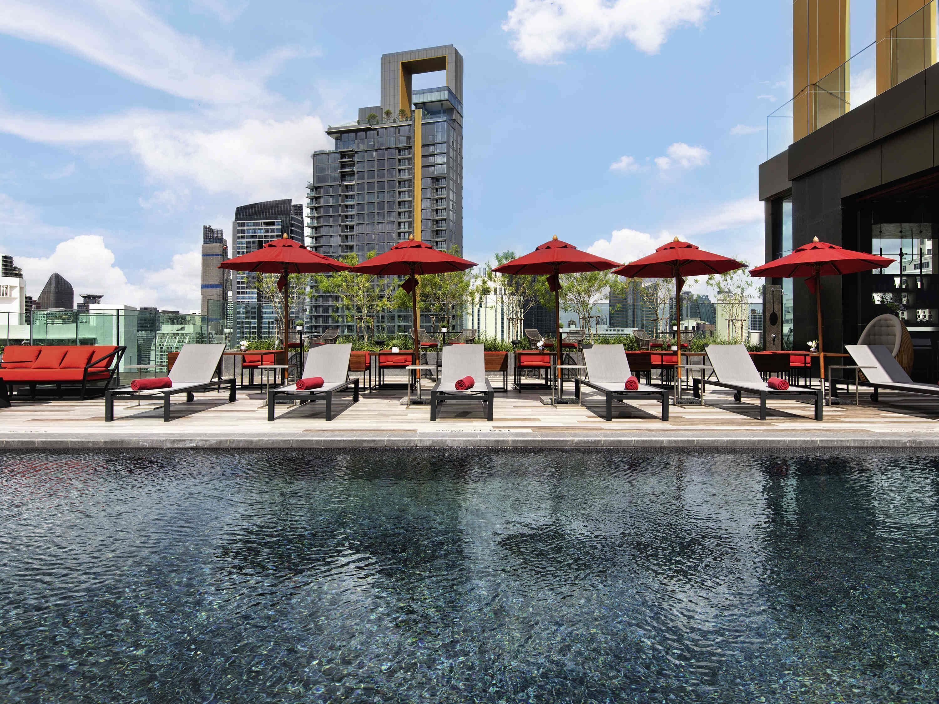 outdoor pool, pool umbrellas, pool loungers