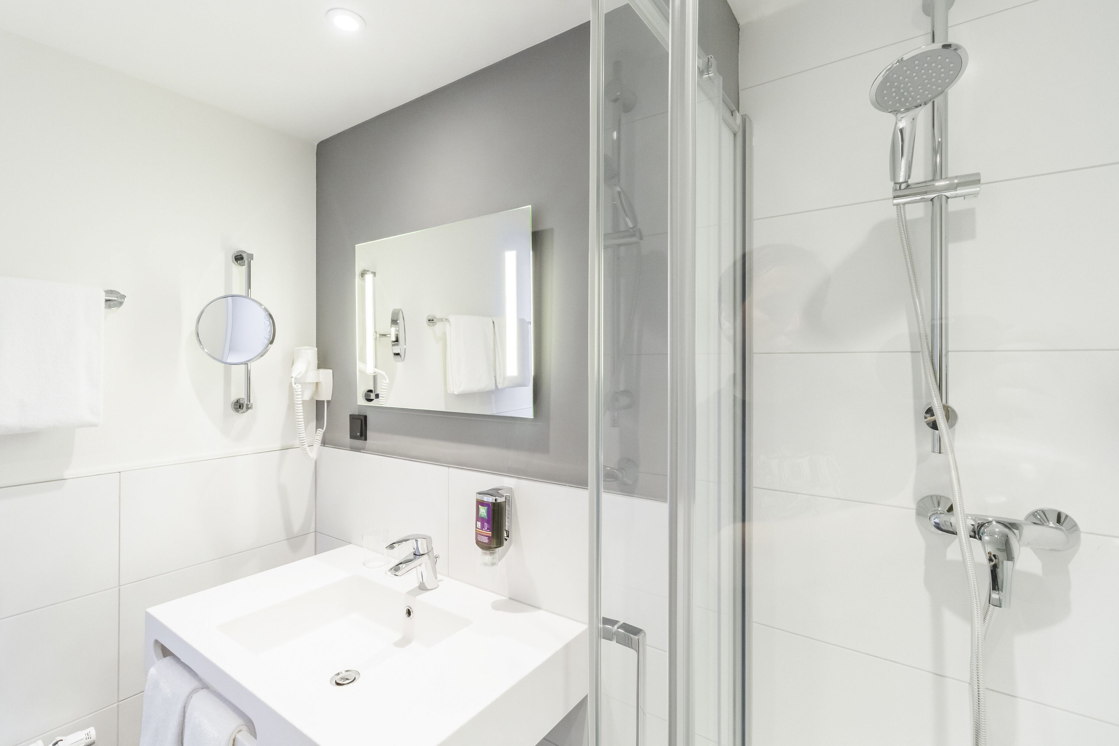 shower, eco-friendly toiletries, hair dryer, towels