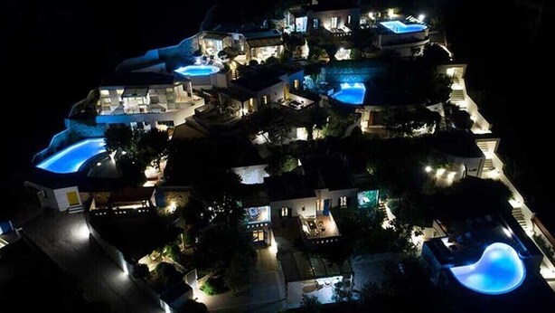 A multi-story hotel with multiple swimming pools, each with its own lighting. - Villa Meadow 5 pax Private Infinity Pool  Beach Hotel Villa Paradise Naxos  (Naxos)