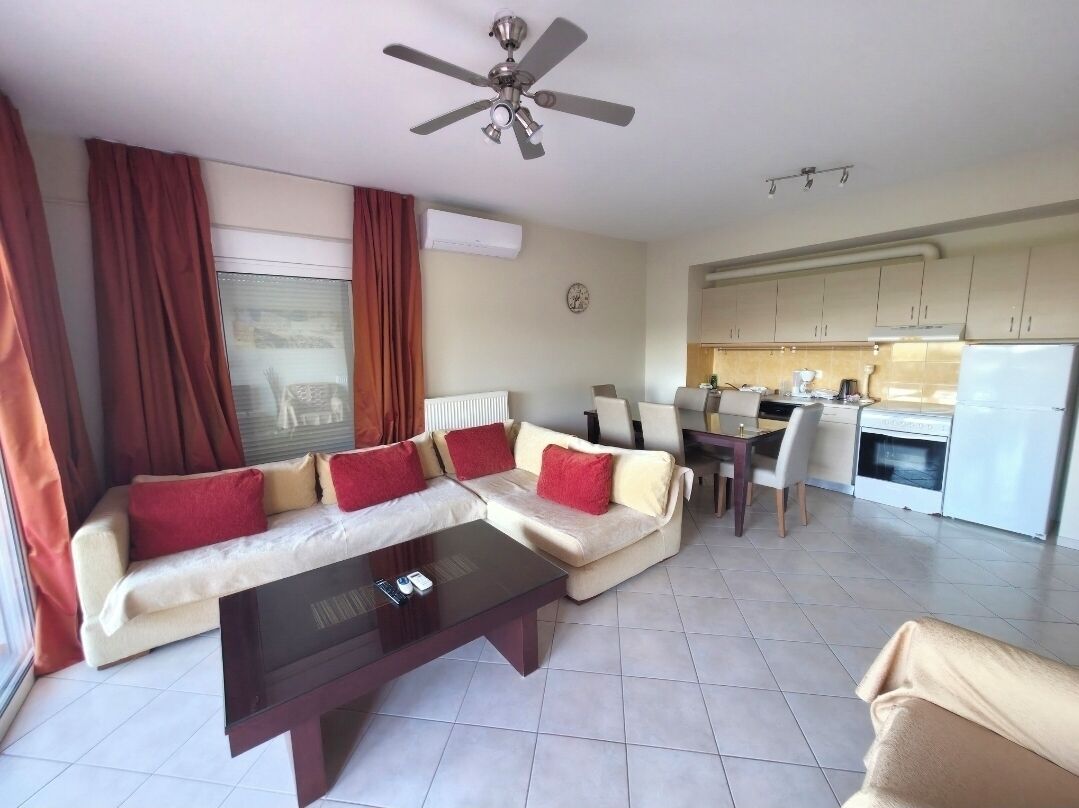 Deluxe appartement, 2 slaapkamers | Woonruimte | Flatscreentelevisie