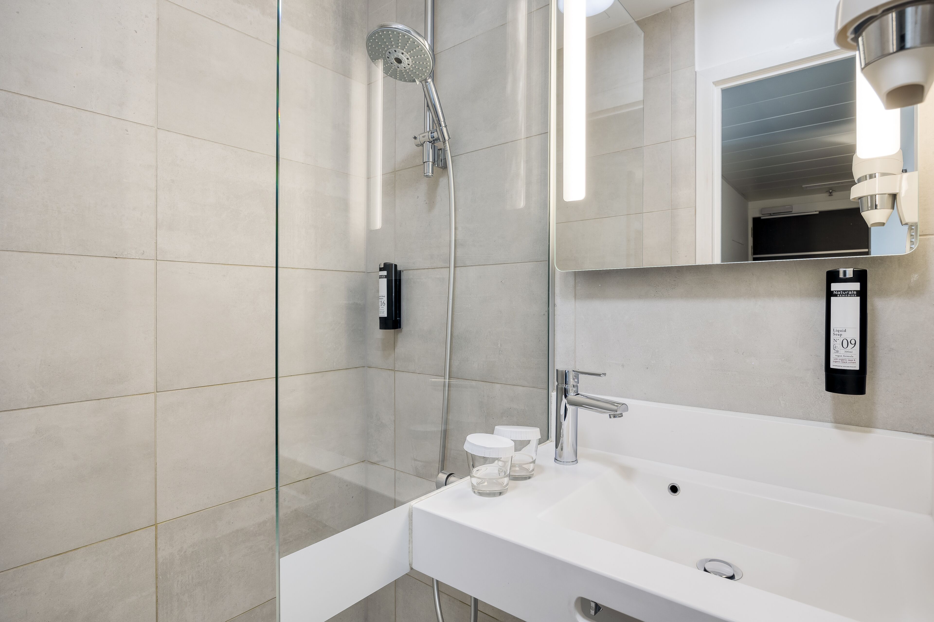 basic quadruple room | bathroom | shower, free toiletries, hair dryer, towels